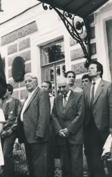 Opening the memorial plaque  of A.A. Akhmatova on the building of the oldest musical school (former Mariinskaya woman gymnasium) located at the house No. 17 in Trud (Labour) Street on 23 June 1989; in the left - L.N. Gumilyev, A.A. Akhmatova's son, in the centre - M.K. Anikushin, People's artist of the USSR, in the right - Yu.M. Fedorenko, the director of the musical school.